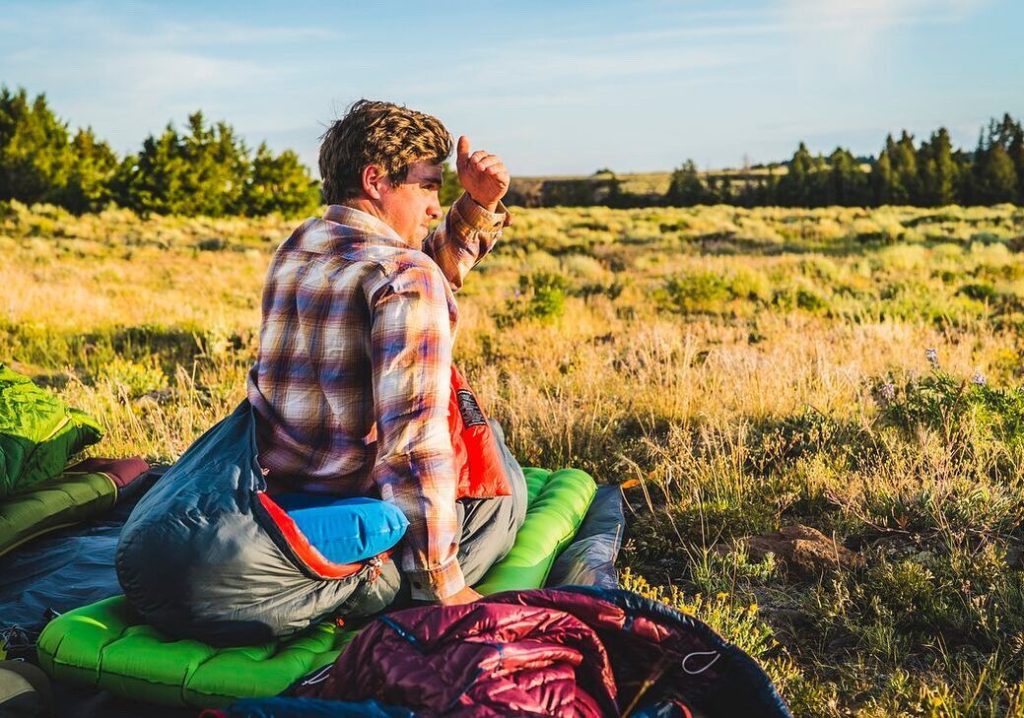 man on sleeping bag