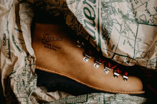 brown and black leather lace up shoe
